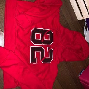 Ardene’s red “82” cropped hoodie